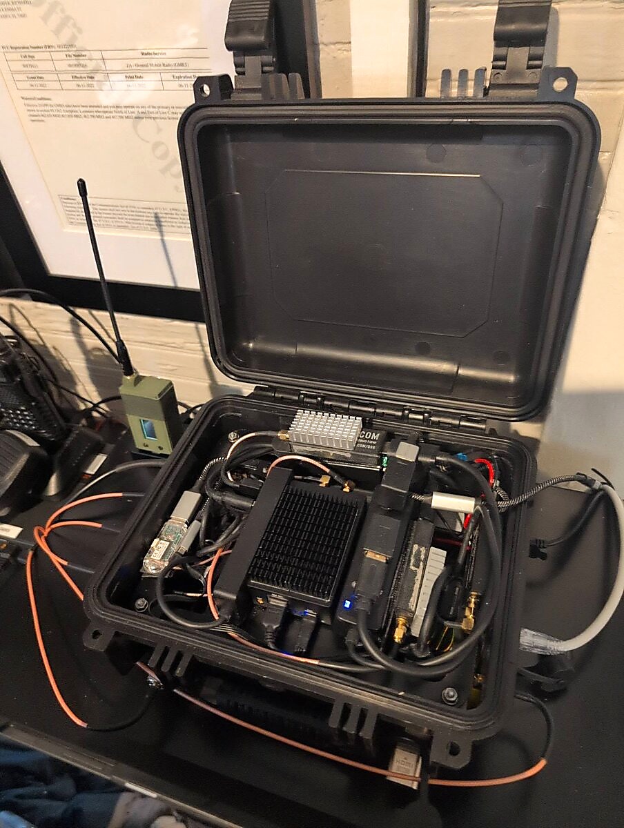 Portable Wombat mesh networking kit in weatherproof case with radio equipment and cables